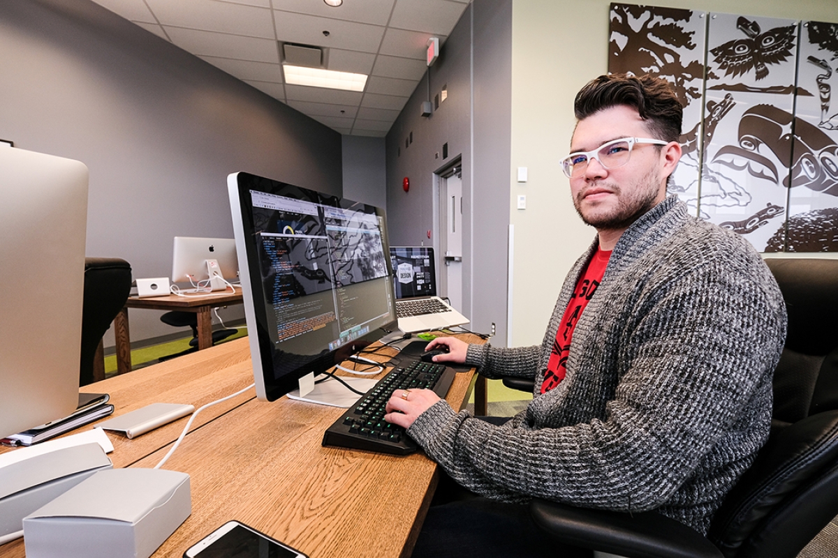 man on computer